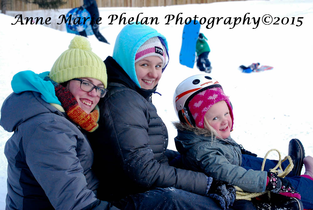 Family on winter sled